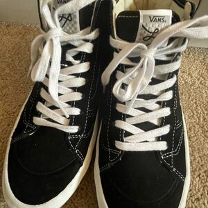 Vans Black and White Skate Shoe with Red Accents